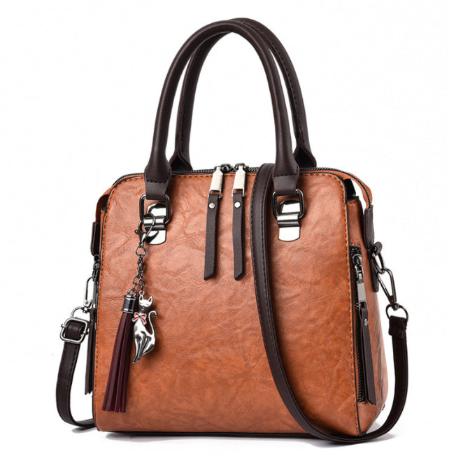 Quinn | Vintage Top Handle Purse with Tassel and Shoulder Strap