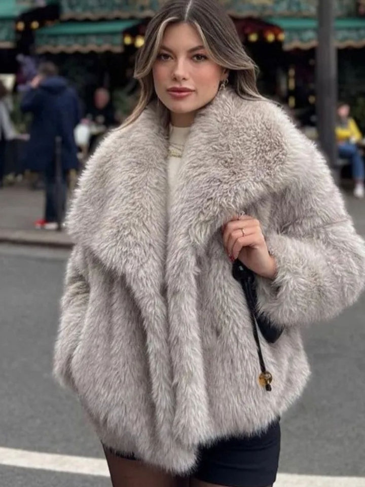Woman in cropped fluffy faux fur jacket
