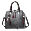 Vintage faux leather purse with tassel