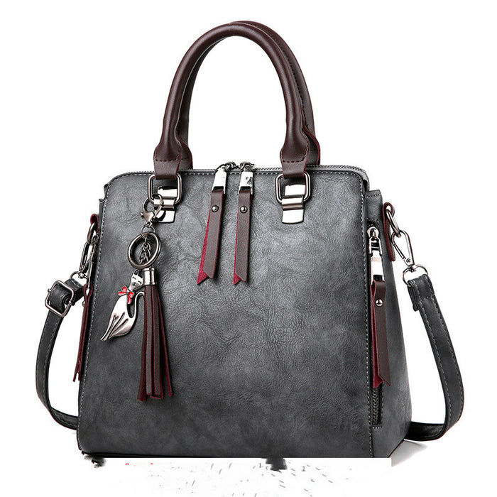 Quinn | Vintage Top Handle Purse with Tassel and Shoulder Strap