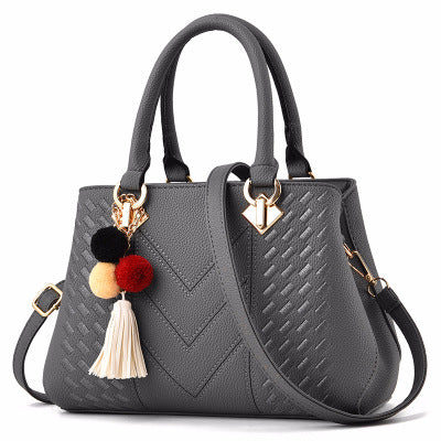 Kinsley | Embossed Top Handle Purse with Pompom Charm