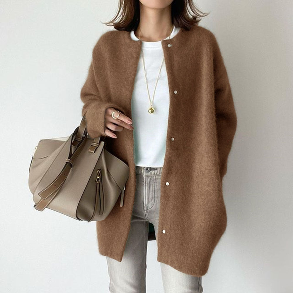 Woman in fuzzy long knit cardigan