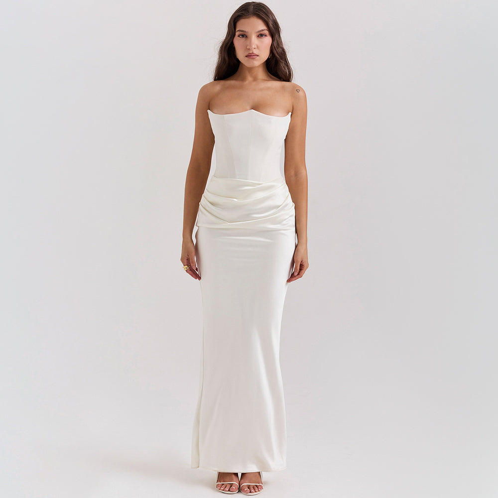 Woman in a strapless satin maxi gown