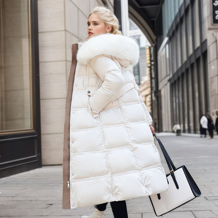 Woman in a long parka with fur hood