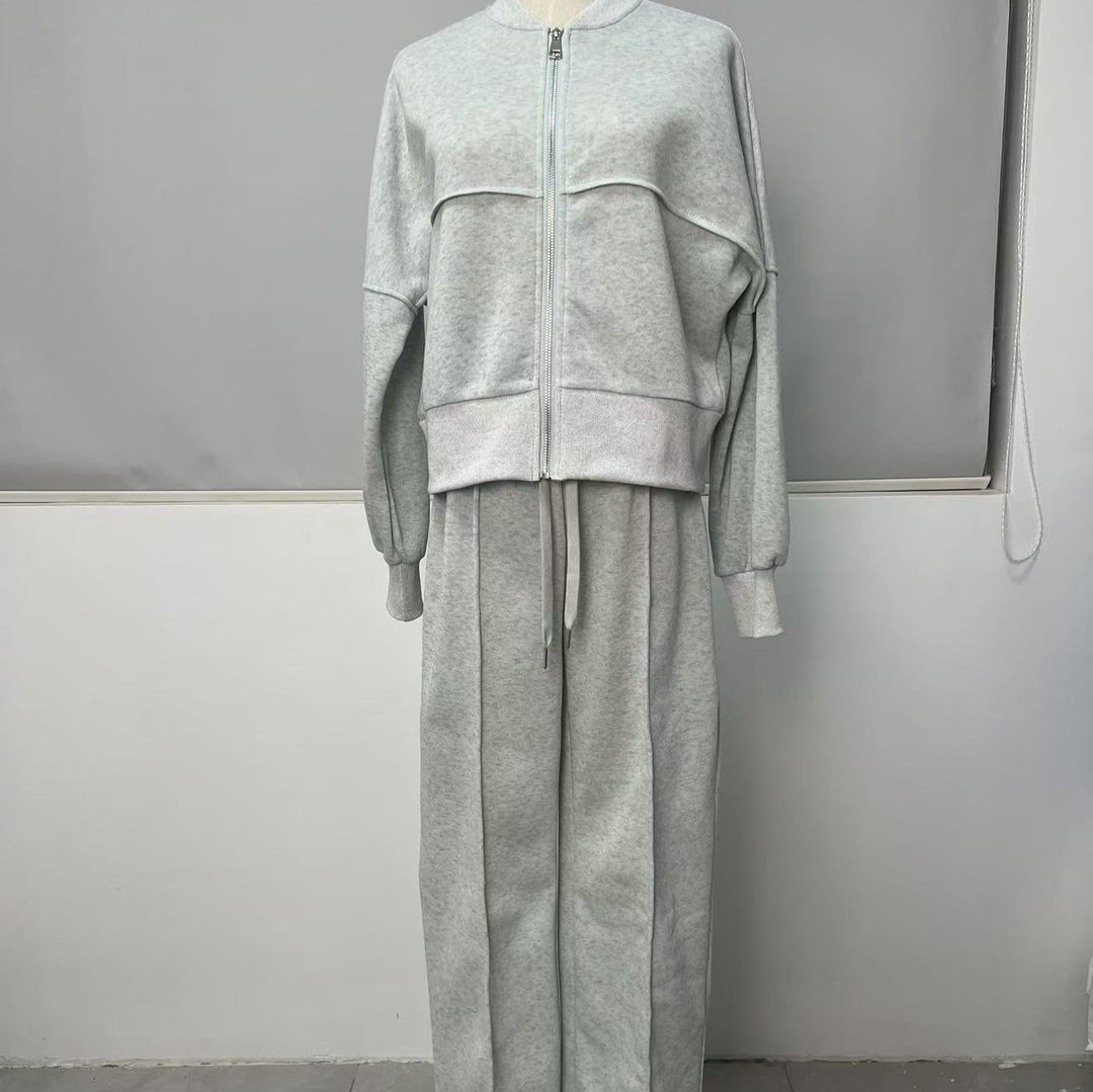 Woman in a zip jacket and wide-leg pants set