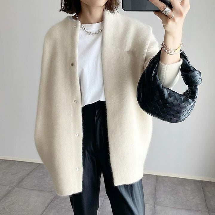 Woman in fuzzy long knit cardigan