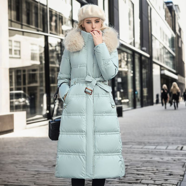 Woman in a long parka with fur hood