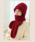 Woman wearing a knit hood with scarf