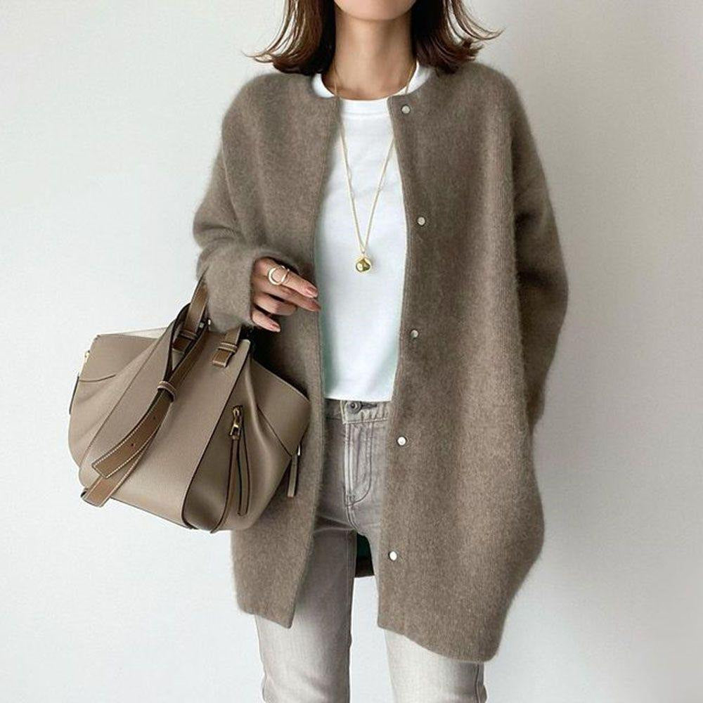 Woman in fuzzy long knit cardigan