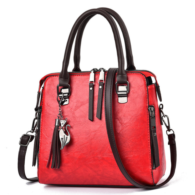 Quinn | Vintage Top Handle Purse with Tassel and Shoulder Strap