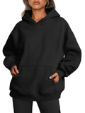 Woman wearing oversized fleece hoodie