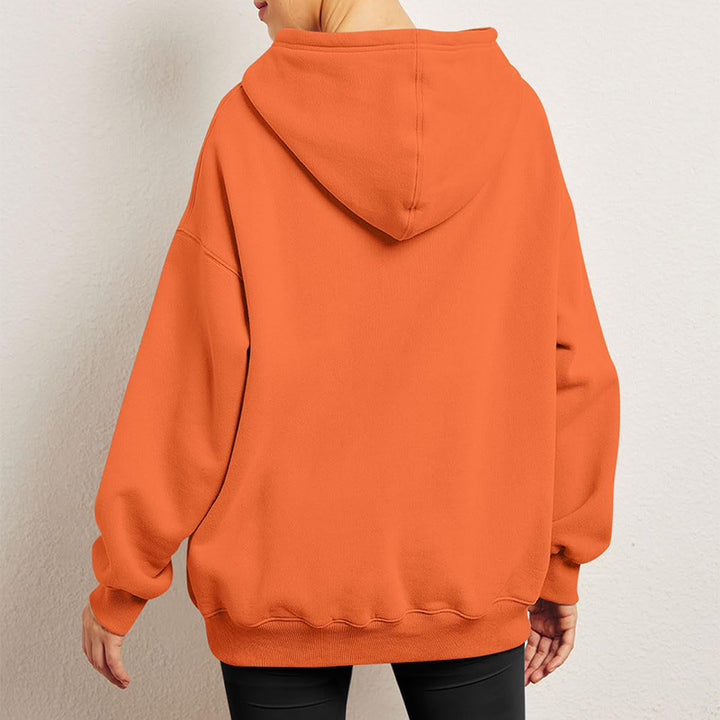 Woman wearing oversized fleece hoodie
