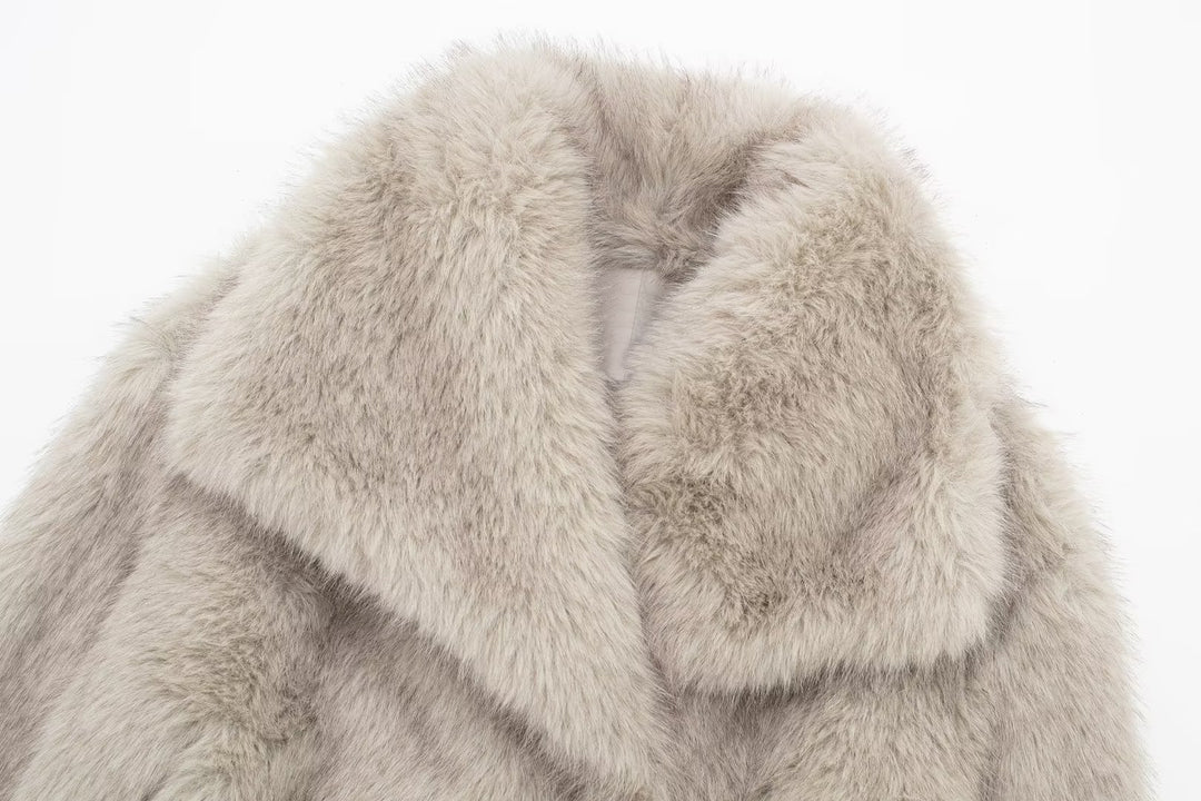Woman in cropped fluffy faux fur jacket