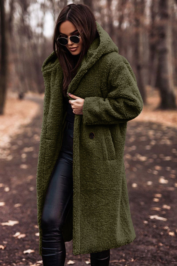 Woman in long hooded teddy coat