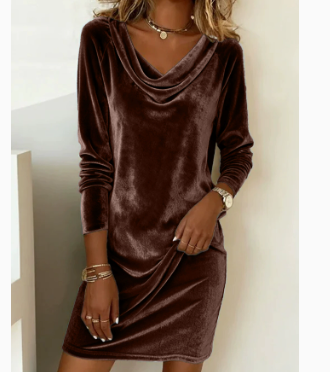 Woman in a velvet cowl neck mini dress