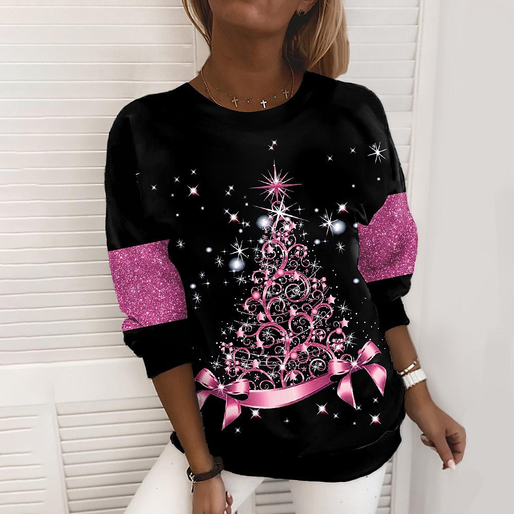 Woman in a glittery Christmas tree sweatshirt