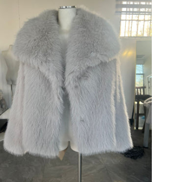 Woman in cropped fluffy faux fur jacket